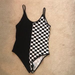 Half and half, checkered and black body suit